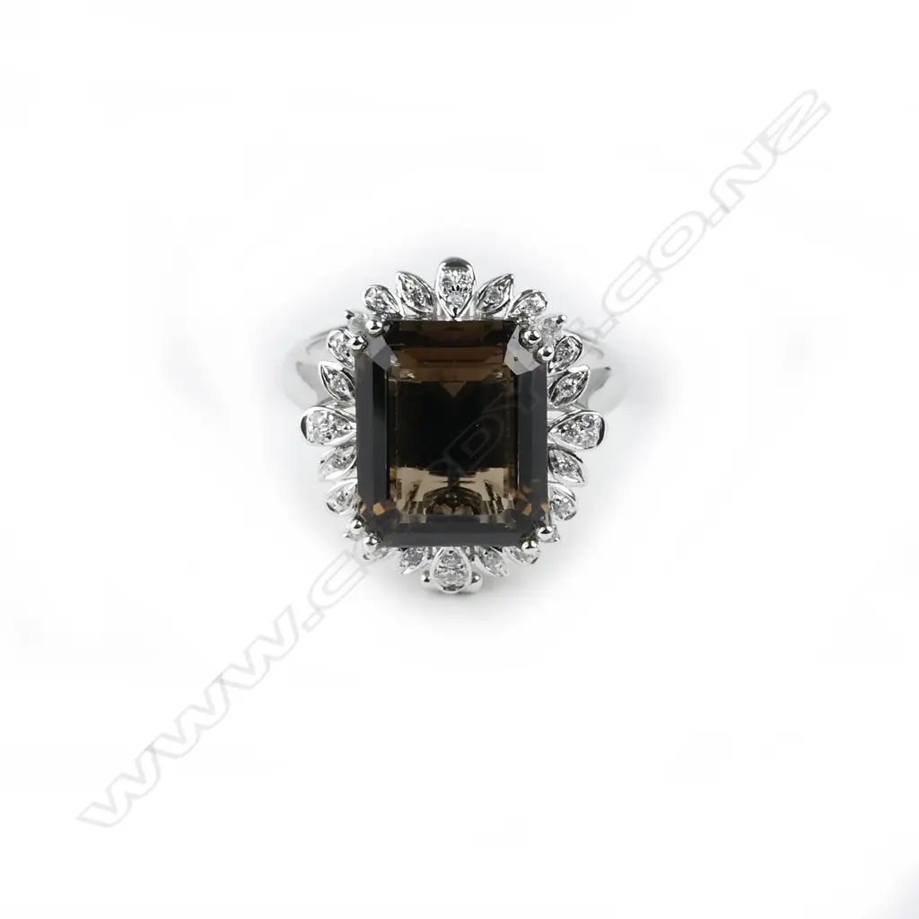 An 18ct. white gold diamond and smoky quartz combination pendant/ring Image 1++