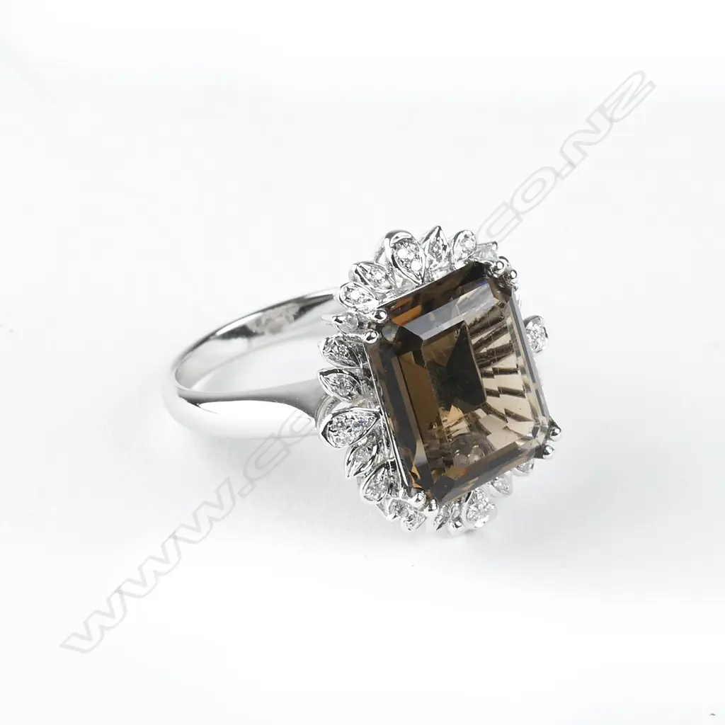 An 18ct. white gold diamond and smoky quartz combination pendant/ring Image 1++