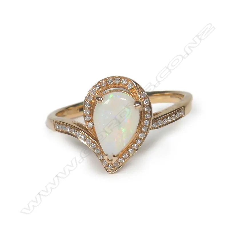 An 18ct rose gold opal and diamond ring Image 1++