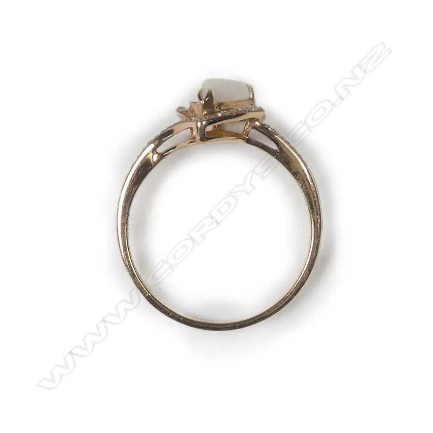 An 18ct rose gold opal and diamond ring Image 1++