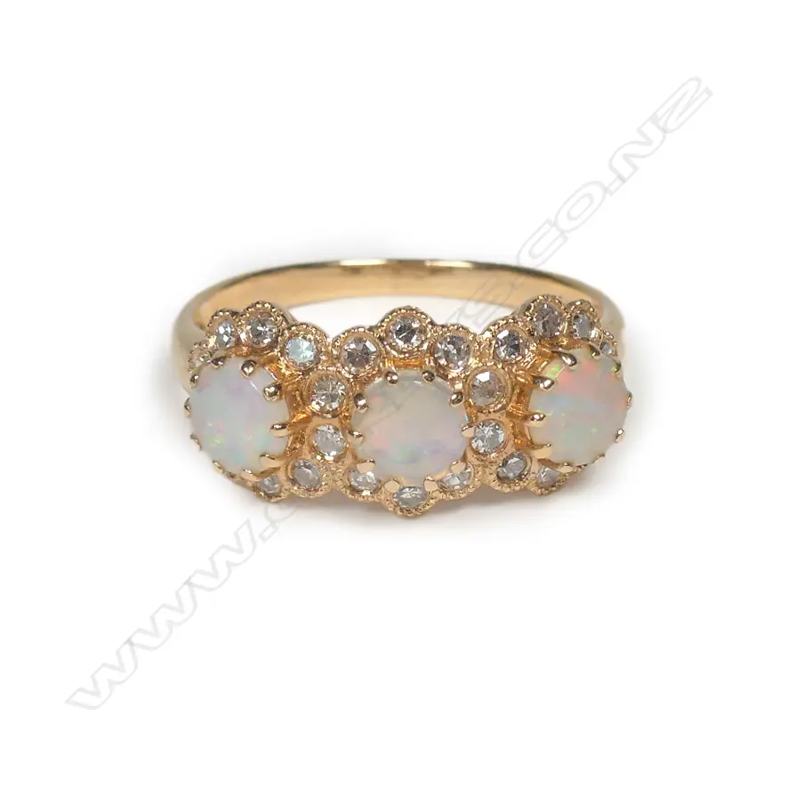 An 18ct rose gold opal and diamond ring Image 1++