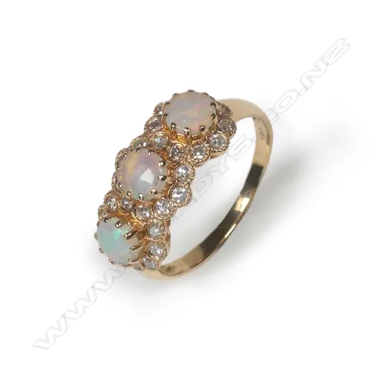 An 18ct rose gold opal and diamond ring