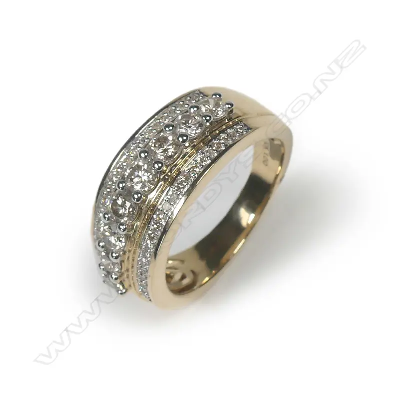 A 10ct gold and diamond dress ring Image 1++