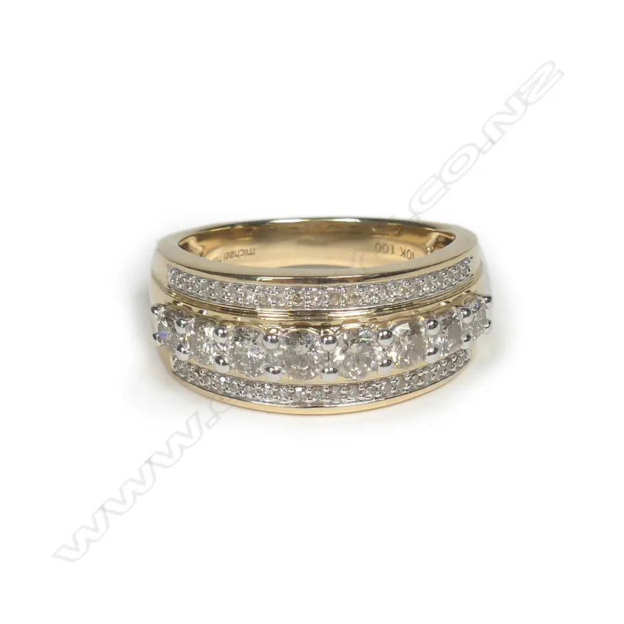 A 10ct gold and diamond dress ring Image 1++