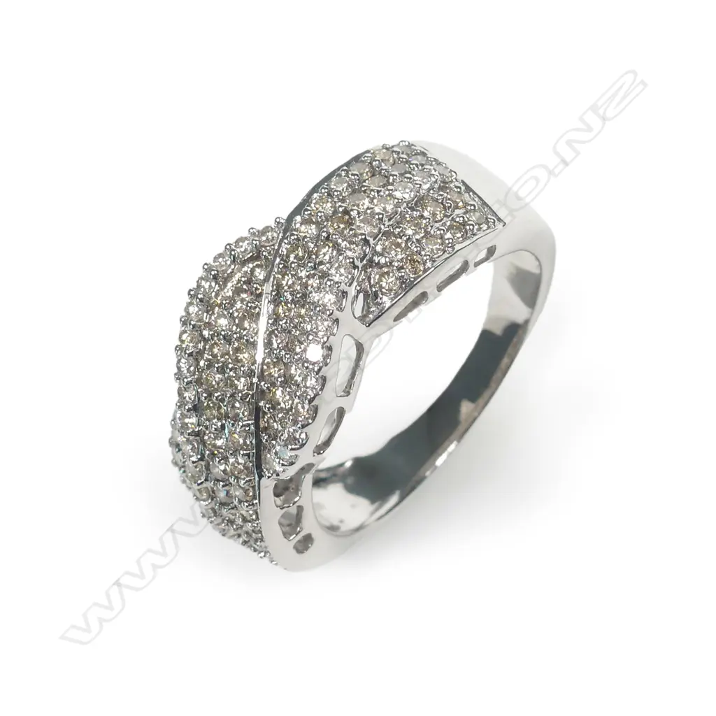 An 18ct white gold and multi diamond dress ring Image 1++