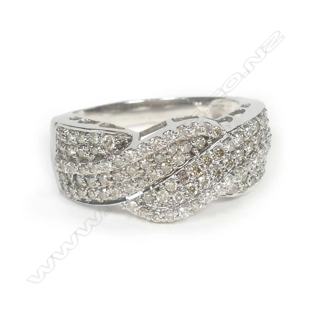 An 18ct white gold and multi diamond dress ring Image 1++