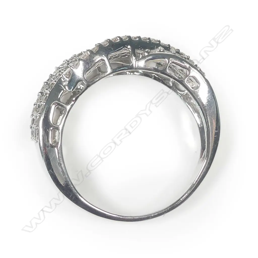An 18ct white gold and multi diamond dress ring Image 1++