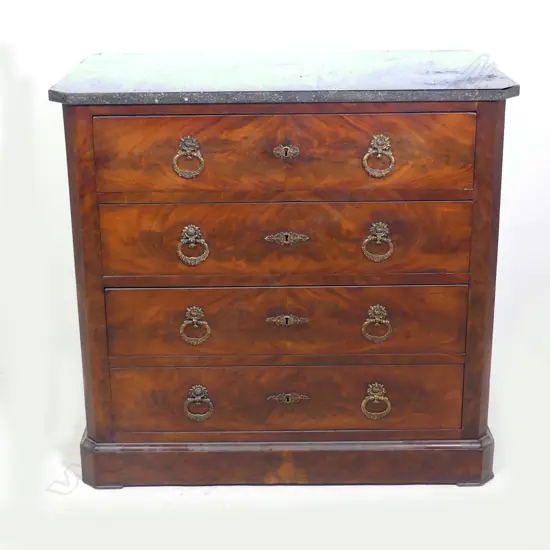 A small proportion Continental marble top mahogany commode