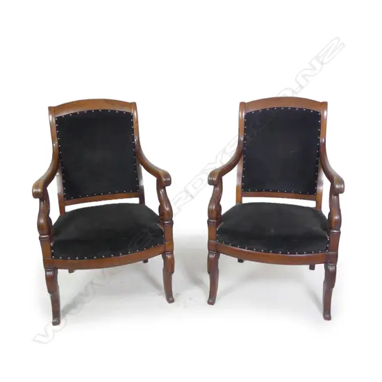 A pair of French Empire mahogany armchairs