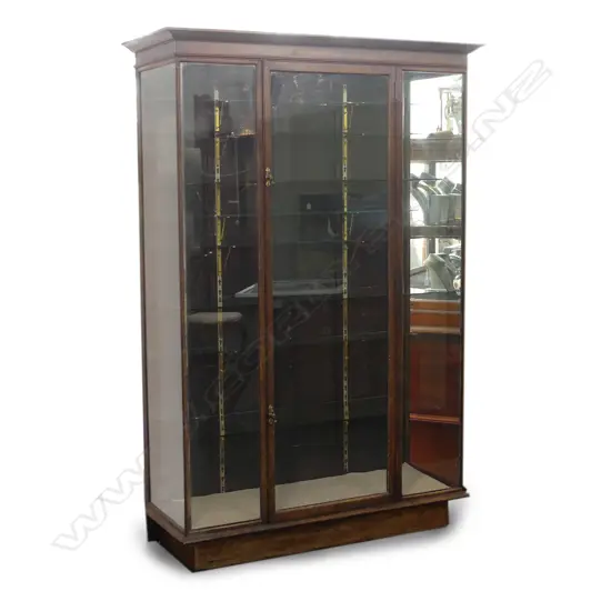 A vintage oak display cabinet
