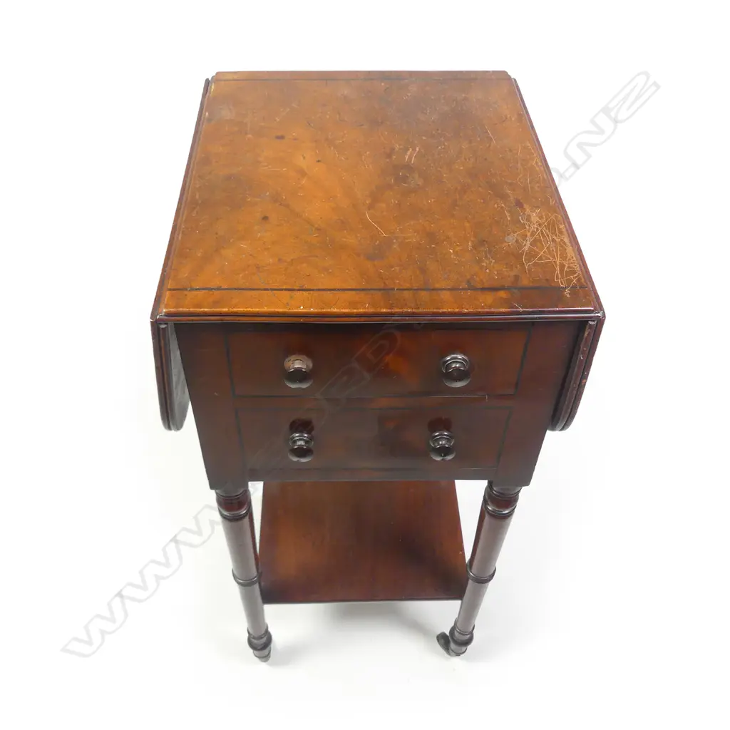 A small Georgian drop leaf side table with two drawers Image 1++