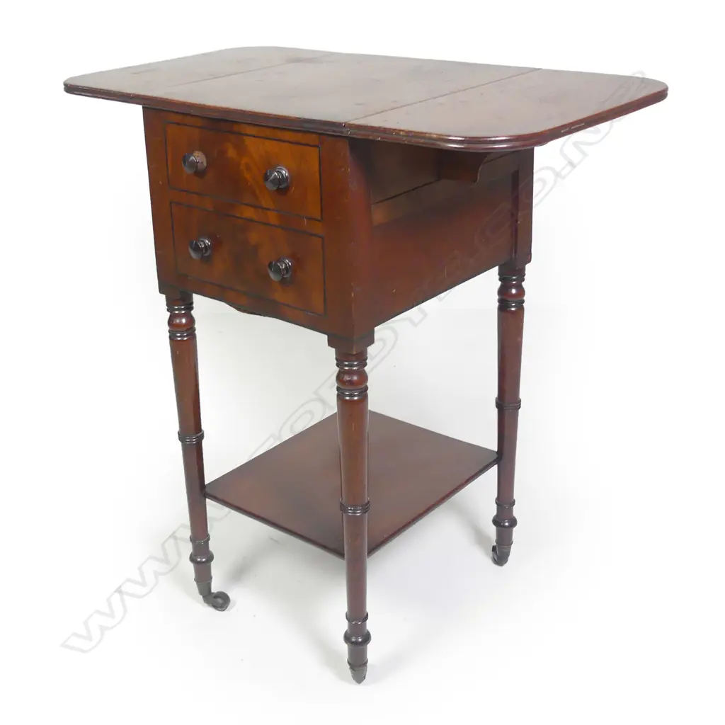 A small Georgian drop leaf side table with two drawers Image 1++