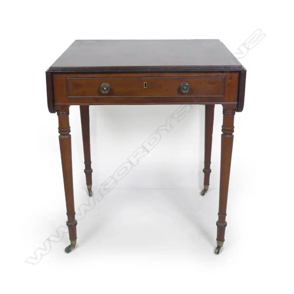 A Regency mahogany Pembroke table Image 1++