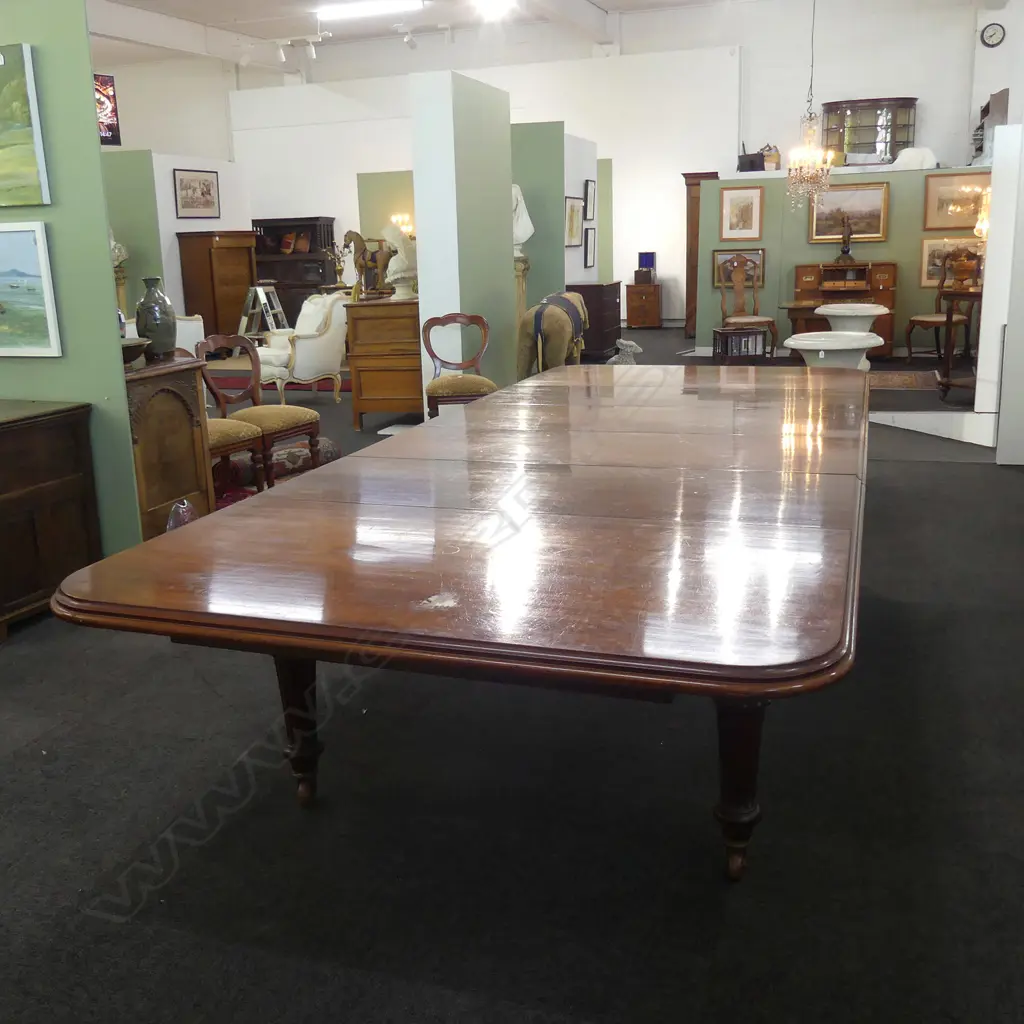 A Victorian mahogany banqueting table Image 1++