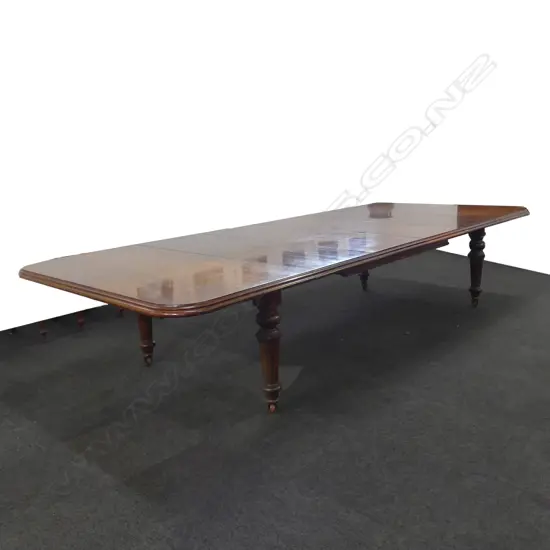A Victorian mahogany banqueting table