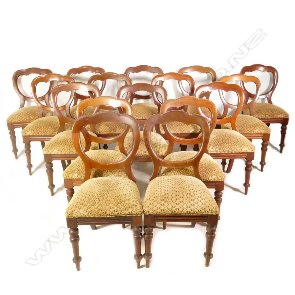 A set of sixteen Victorian mahogany balloon back dining chairs Image 1++