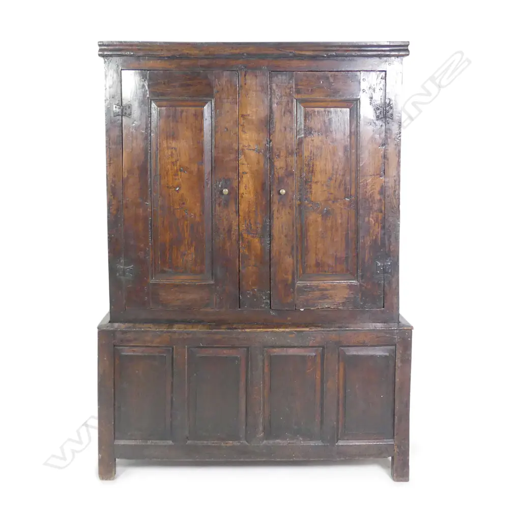 An 18thC Georgian country oak livery cupboard on stand Image 1++