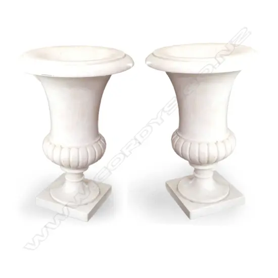 A pair of large and impressive antique marble urns