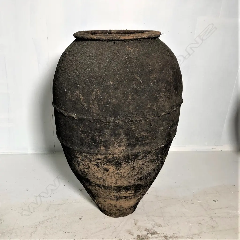 An old European terracotta tall olive oil storage jar Image 1++