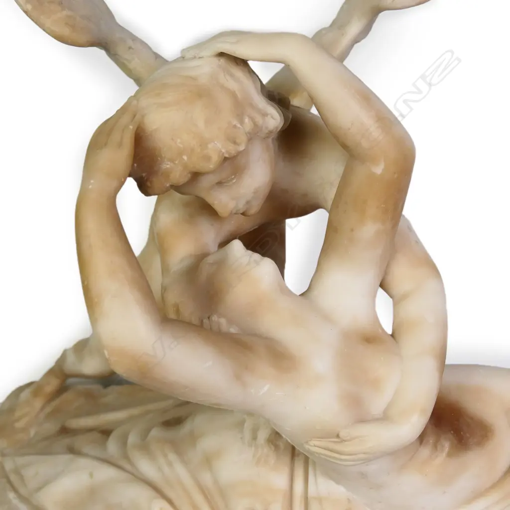 A Victorian alabaster sculpture depicting Psyche Revived by Cupid's Kiss Image 1++