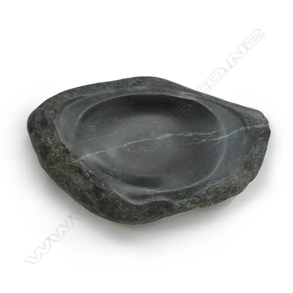 A large dark green pounamu carved boulder bowl Image 1++