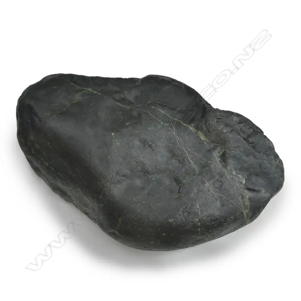 A large dark green pounamu carved boulder bowl Image 1++