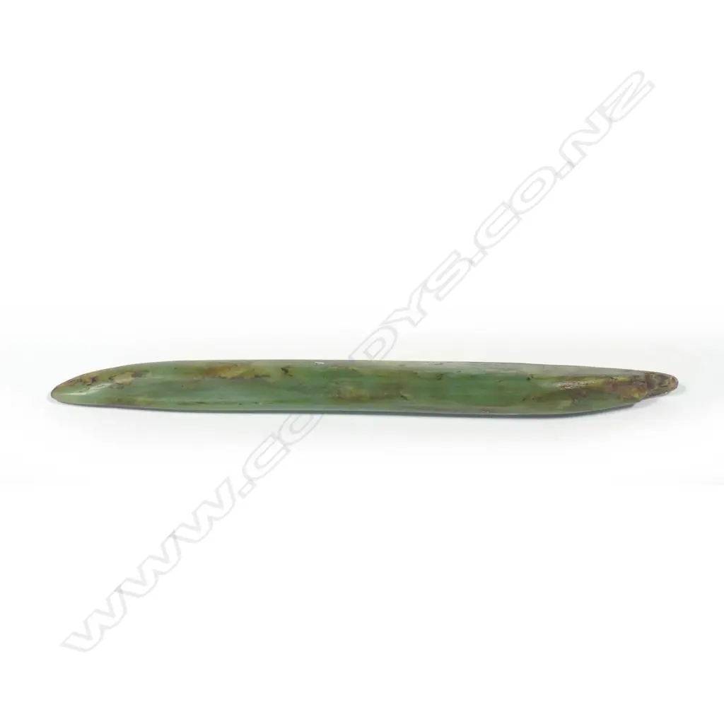 A pre-European Maori pounamu long kuru (ear pendant) Image 1++