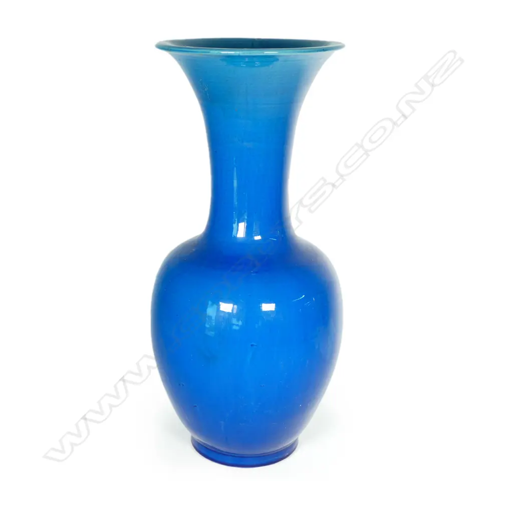 A large Chinese porcelain blue monochrome glazed fengweizun vase Image 1++