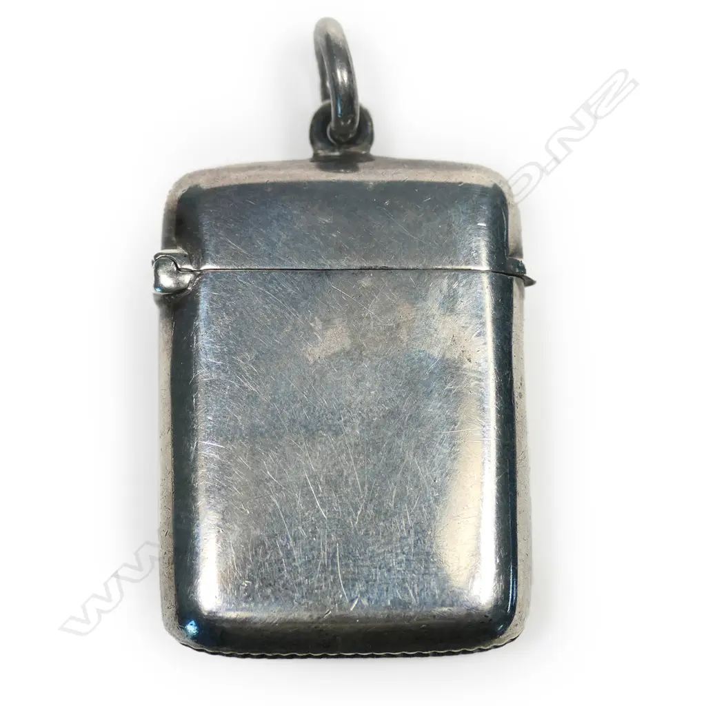 An Edwardian silver shamrock decorated vesta Image 1++