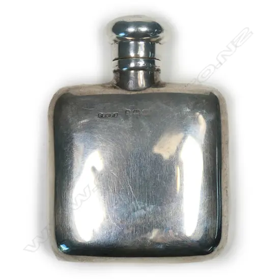 A small silver pocket flask