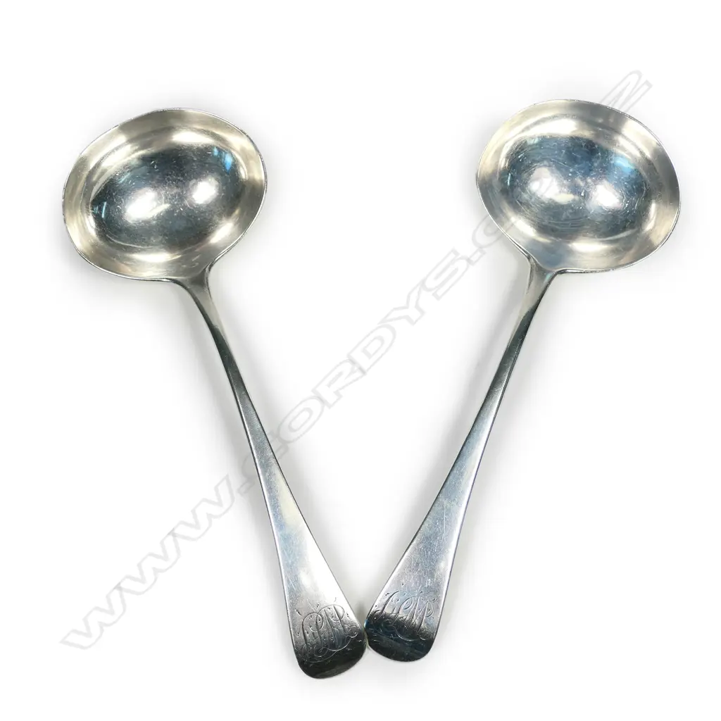A pair of George III silver ladles Image 1++