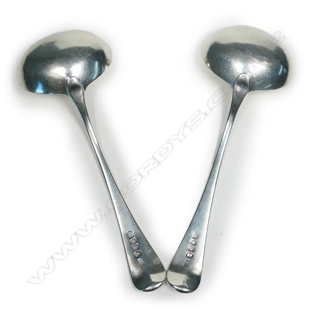 A pair of George III silver ladles Image 1++