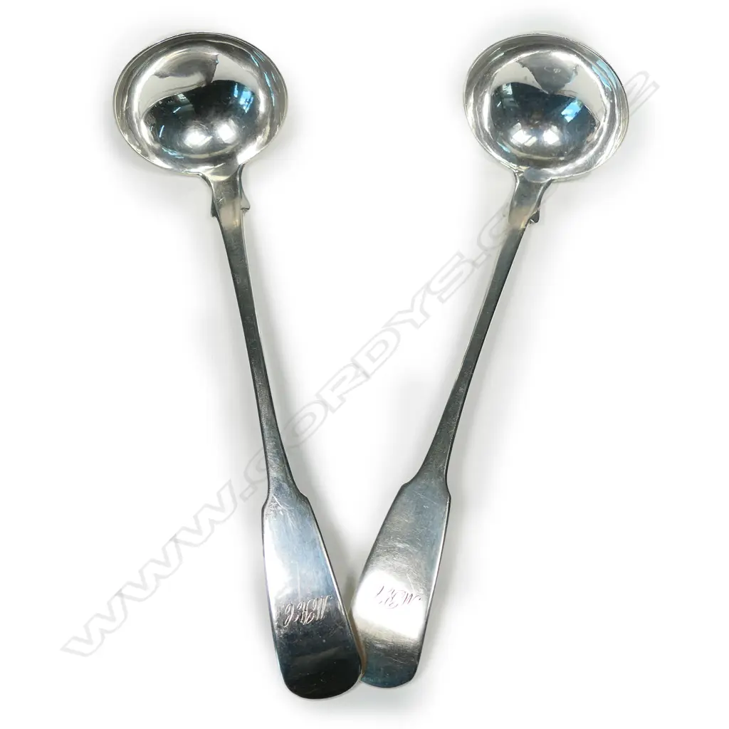 A pair of Victorian Scottish silver cream ladles Image 1++