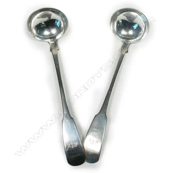 A pair of Victorian Scottish silver cream ladles