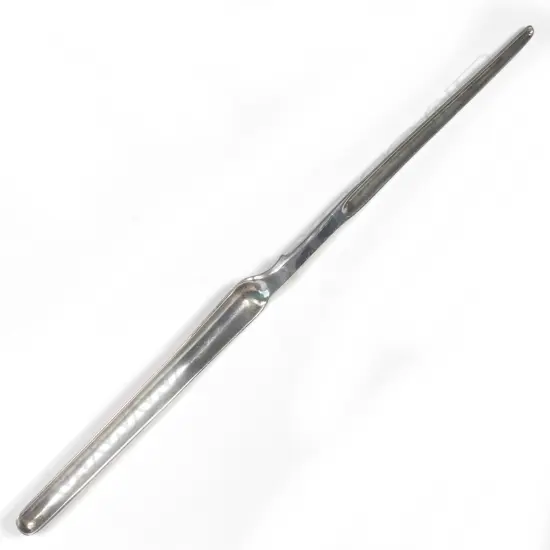A silver double ended marrow scoop