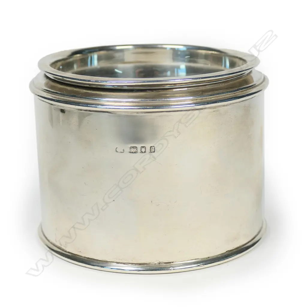 A silver tea cannister Image 1++