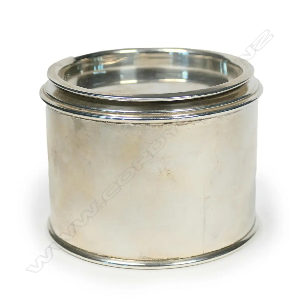 A silver tea cannister Image 1++