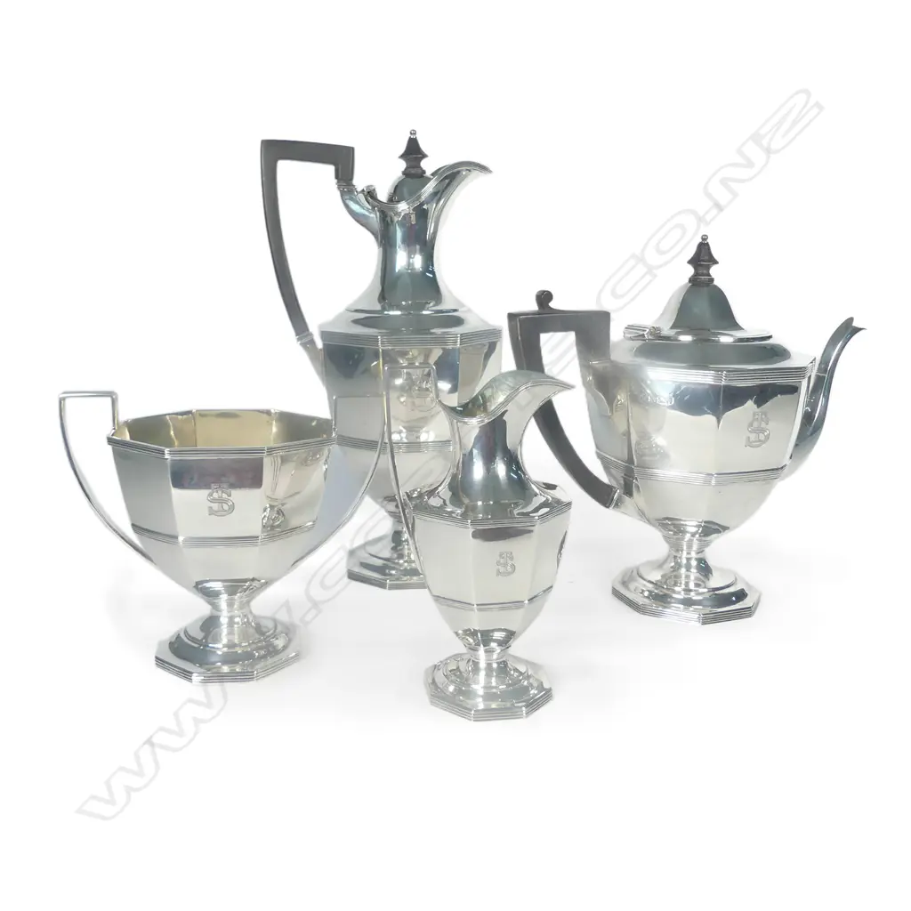 A late Victorian sterling silver four piece tea set Image 1++