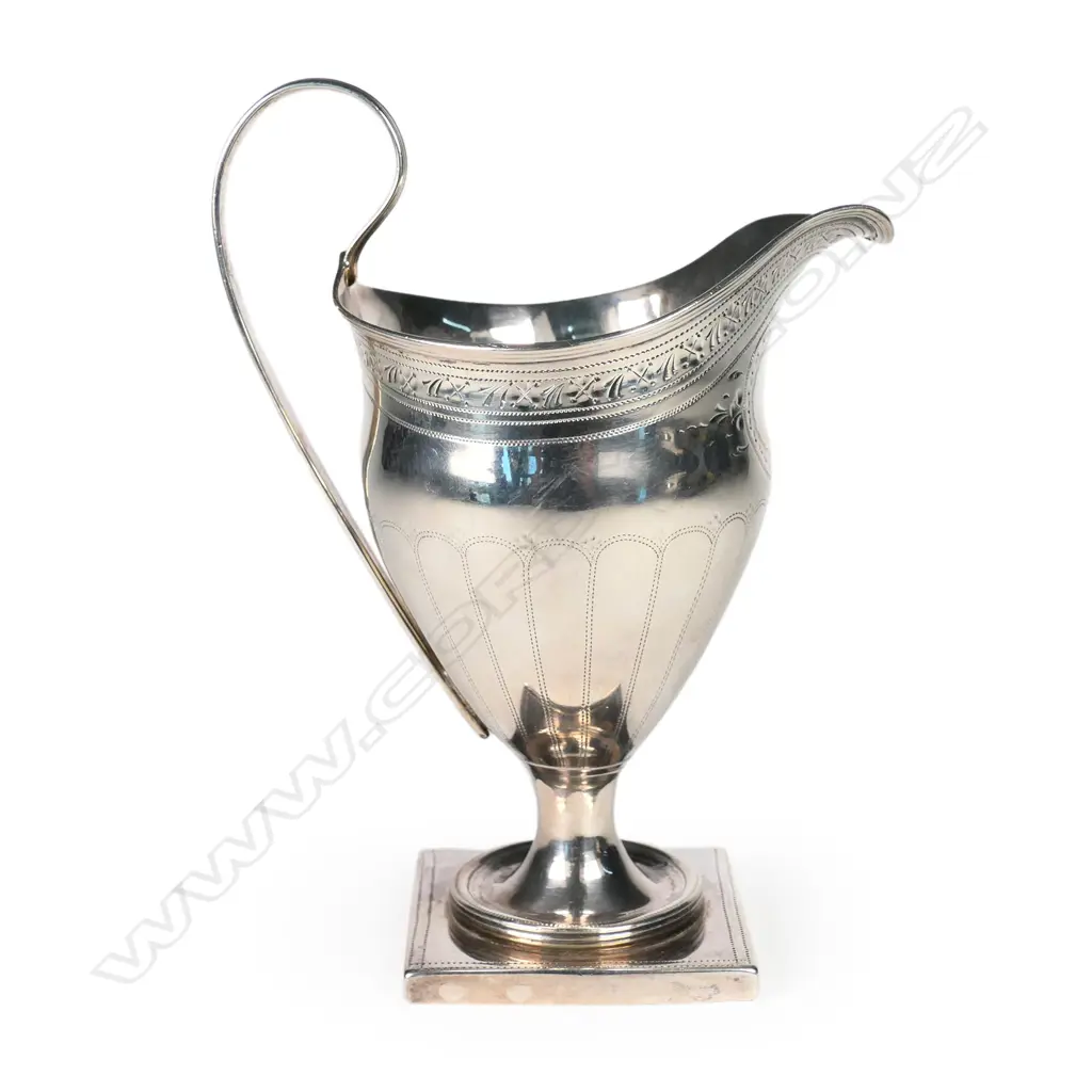A George III silver pedestal cream jug Image 1++