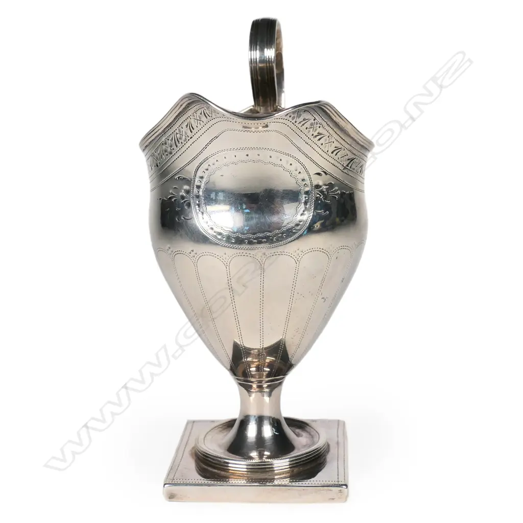 A George III silver pedestal cream jug Image 1++