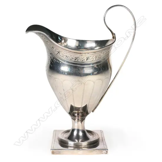 A George III silver pedestal cream jug