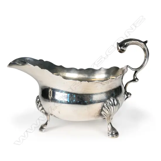 A heavy 1920's silver sauce boat