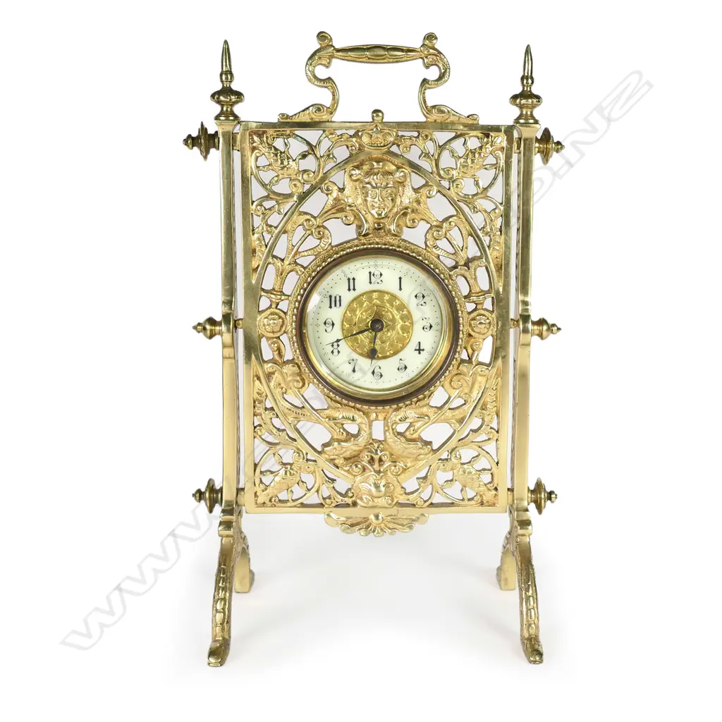 A 19thC French decorative brass table/desk clock Image 1++