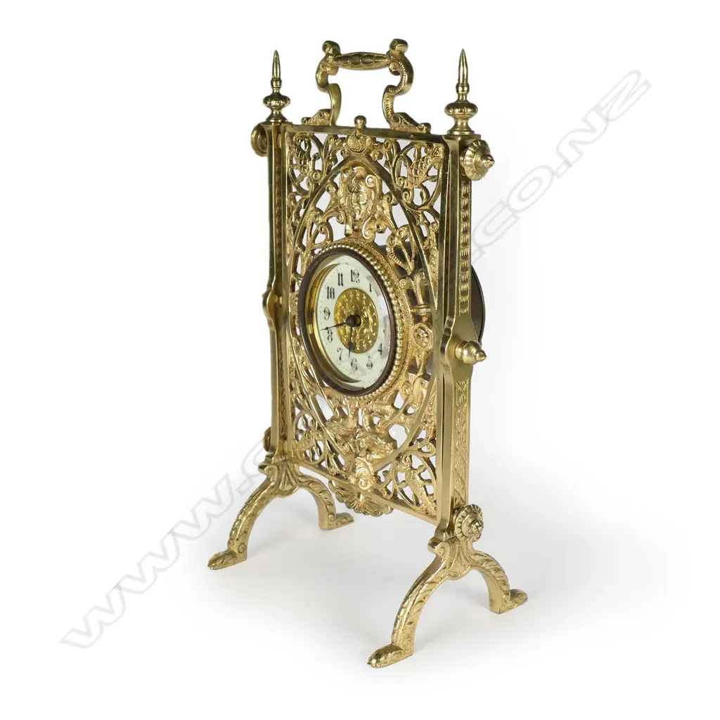 A 19thC French decorative brass table/desk clock Image 1++