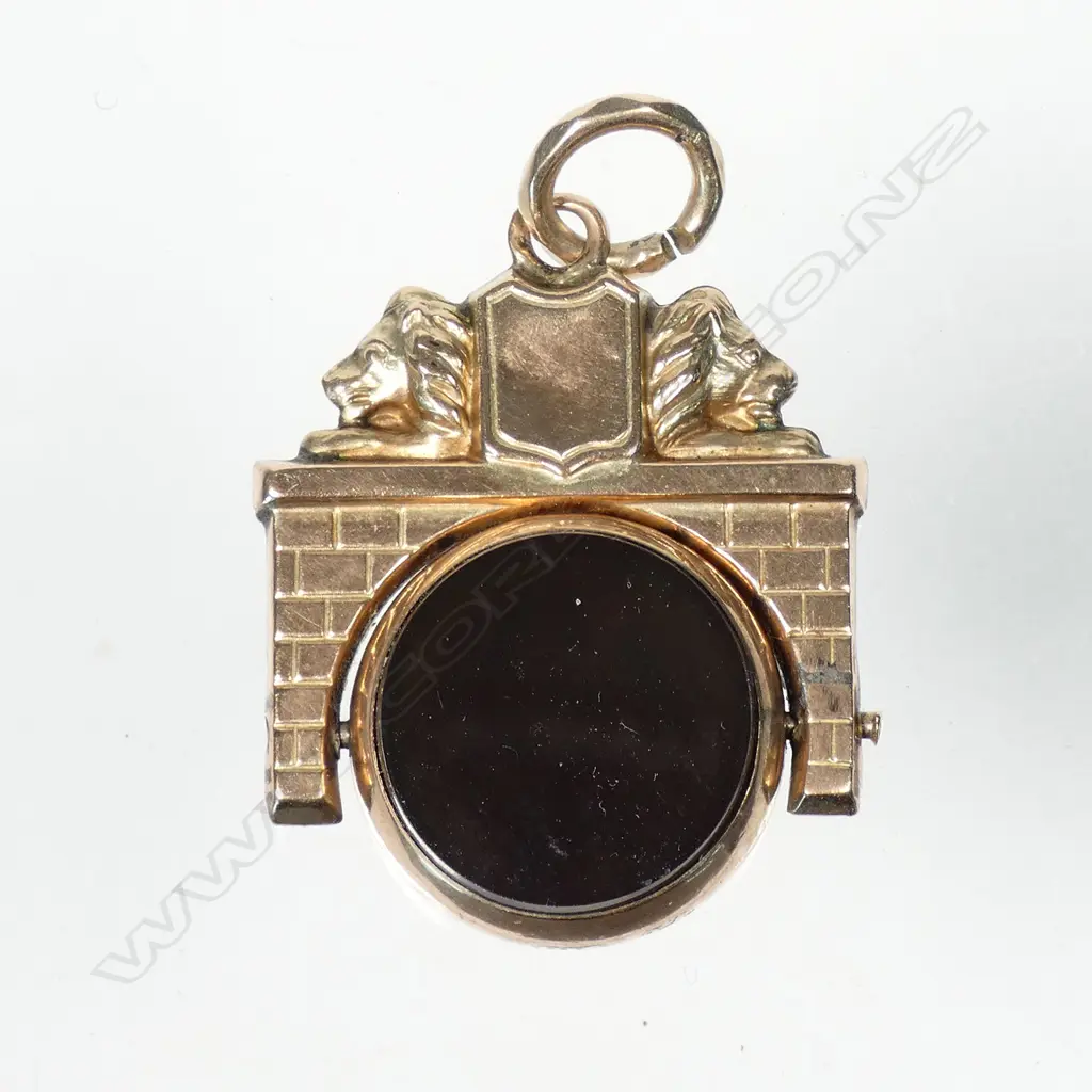 A 9ct rose gold and bloodstone fob spinner Image 1++