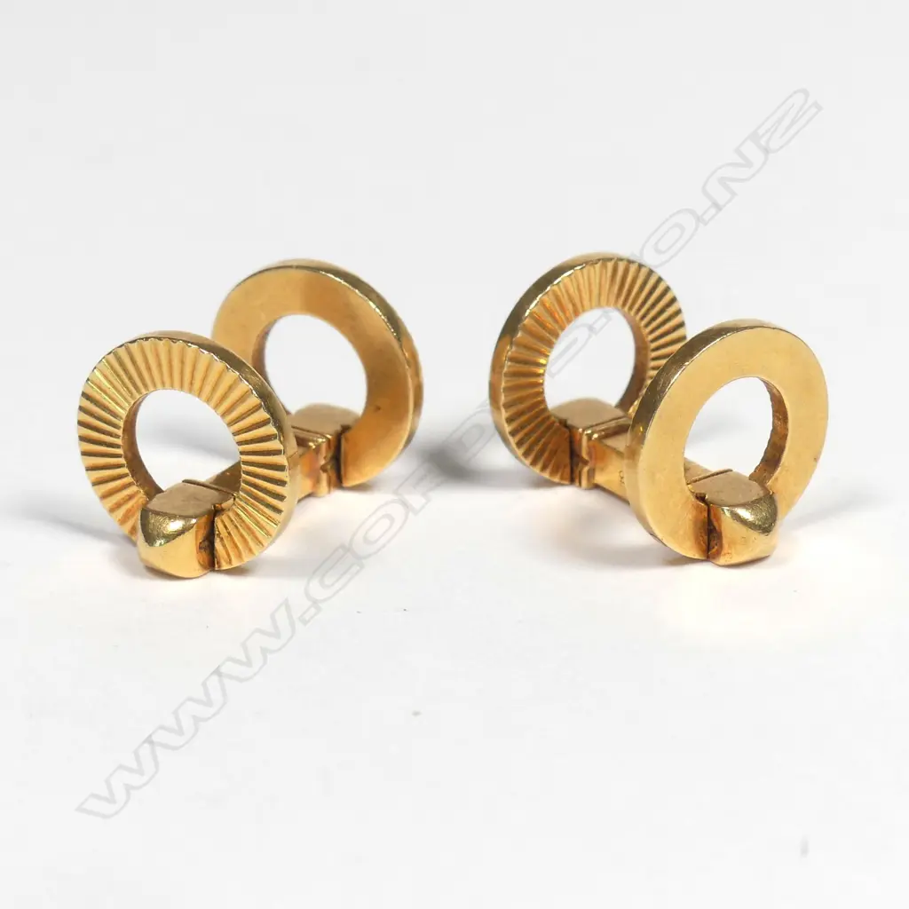 A pair of Cartier 18ct gold 'stirrup' cufflinks Image 1++