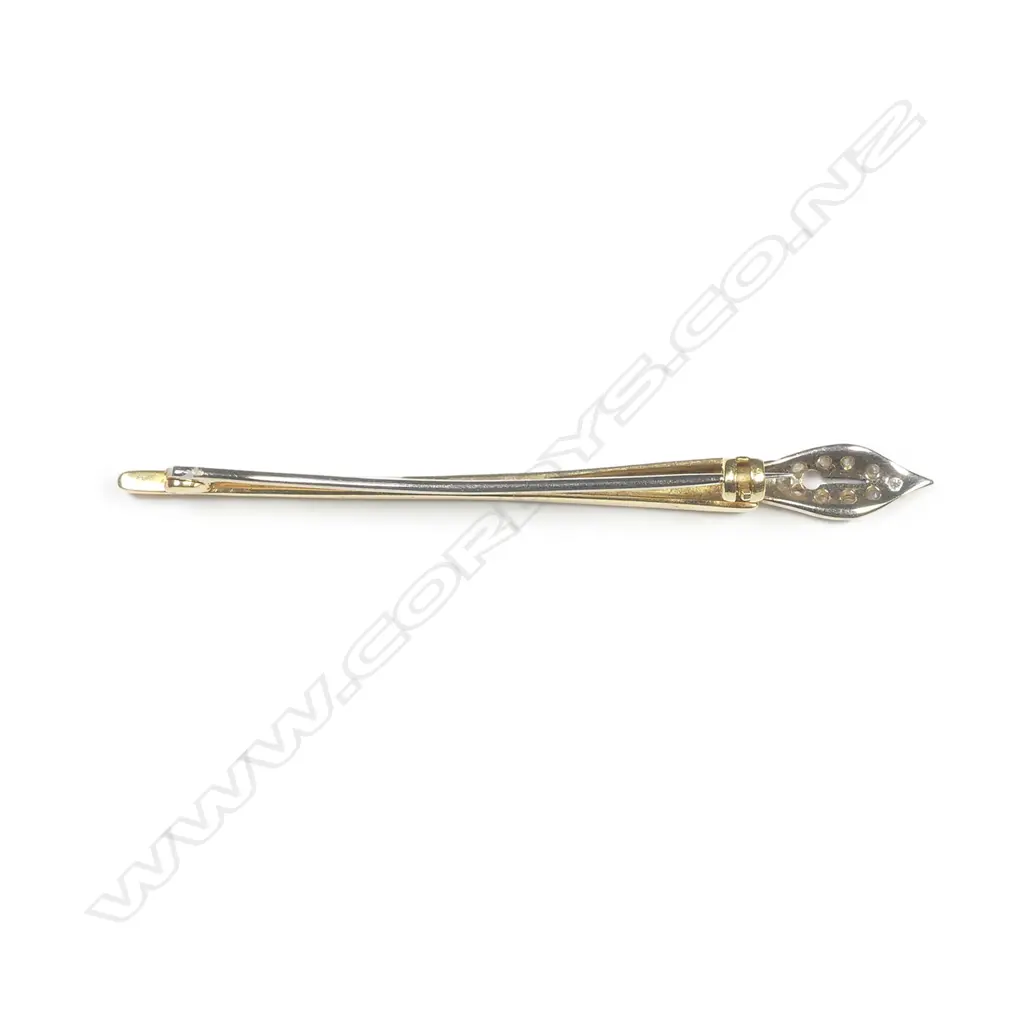 An 18ct gold brooch Image 1++