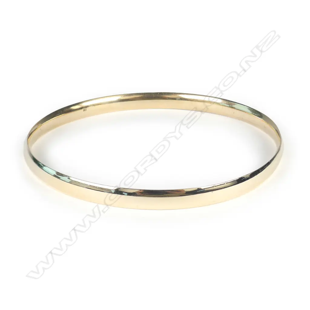 A 9ct gold half hoop bangle Image 1++