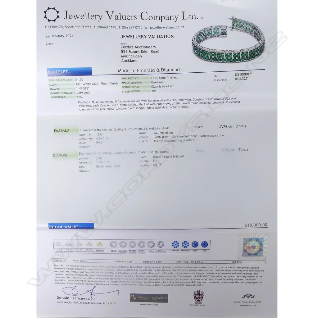 A 14ct white gold emerald and diamond bracelet Image 1++