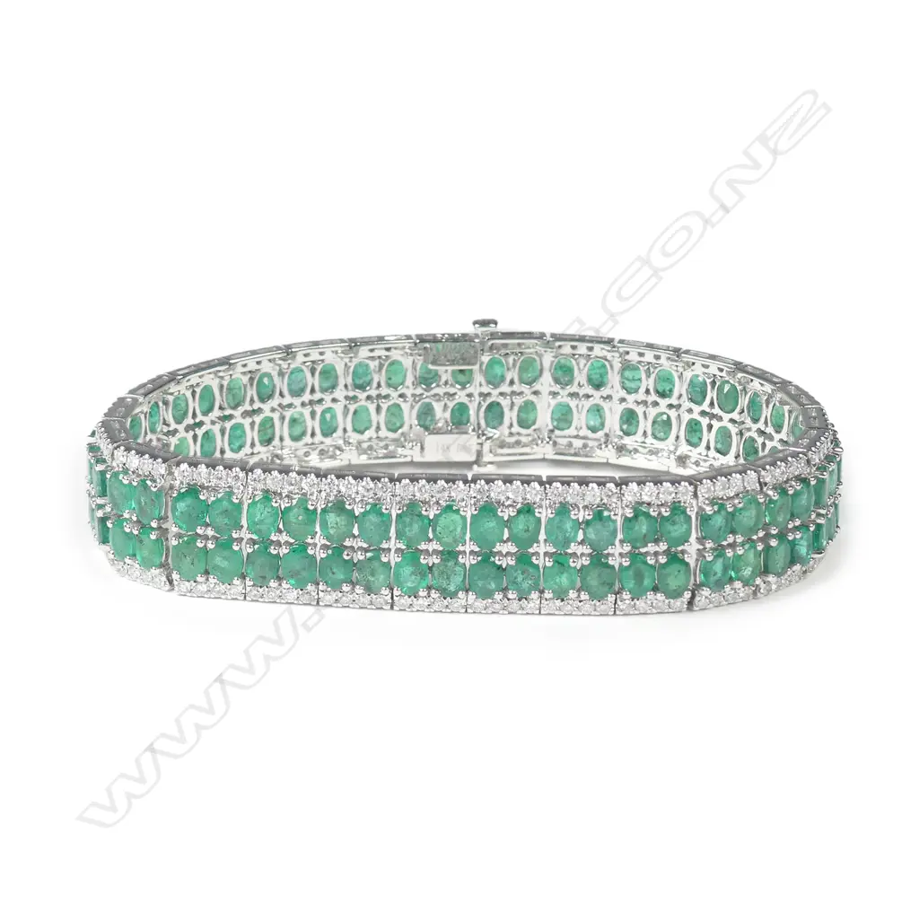 A 14ct white gold emerald and diamond bracelet Image 1++